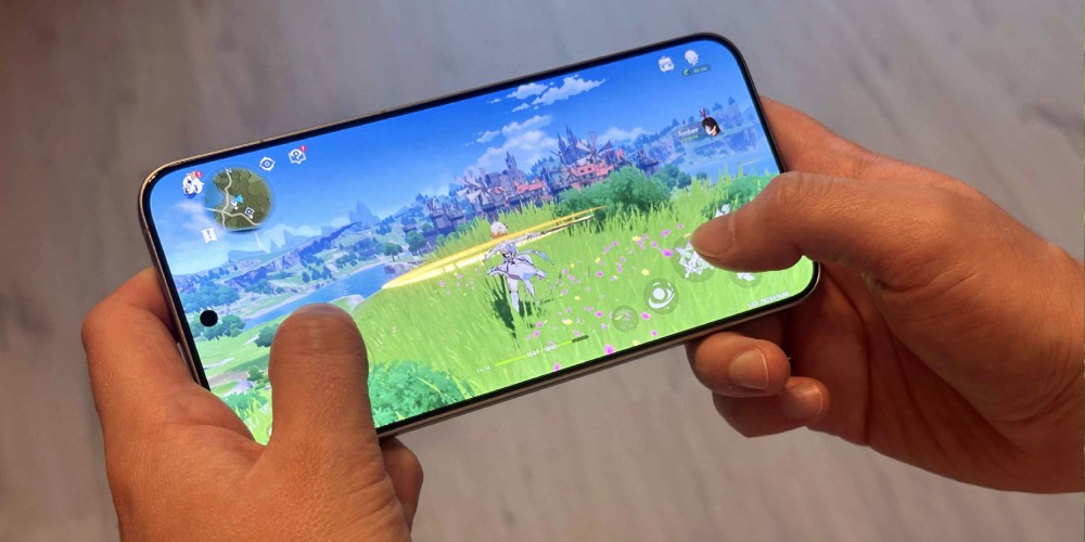 ekran telefonu z grą Genshin Impact