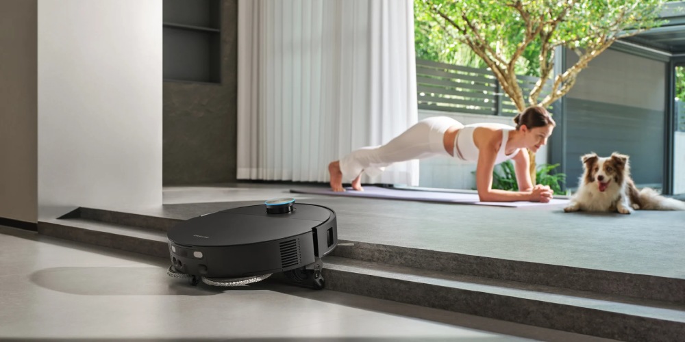 robot sprzątający Dreame X60 Ultra Complete pokonuje próg w domu