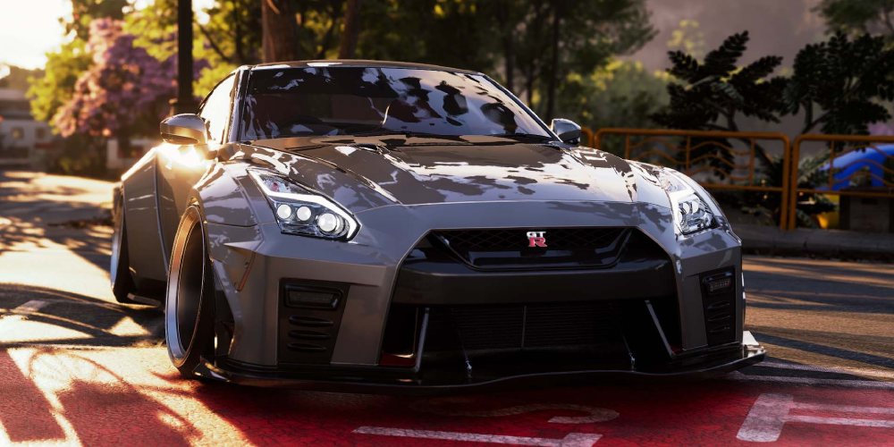 srebrny Nissan GTR na drodze w dzień