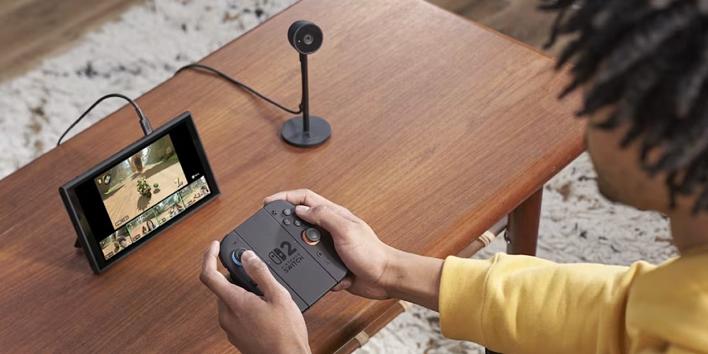 Mężczyzna gra w trybie tabletop na Nintendo Switch 2