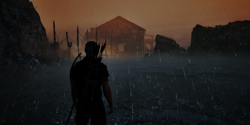 Deszczowa noc przed drewnianą budowlą w Gothic 1 Remake