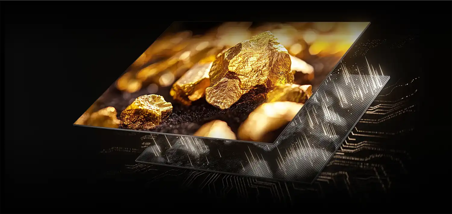 Ekran telewizora z wyświetlonymi złotymi bryłkami na czarnym tle, ukazany w perspektywie.