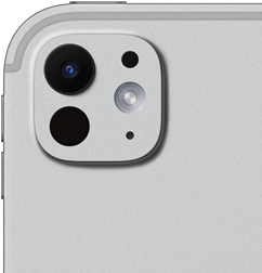 Widoczny od tyłu iPad Pro w kolorze srebrnym z systemem aparatów pro z pięcioelementowym obiektywem i adaptacyjnym fleszem True Tone