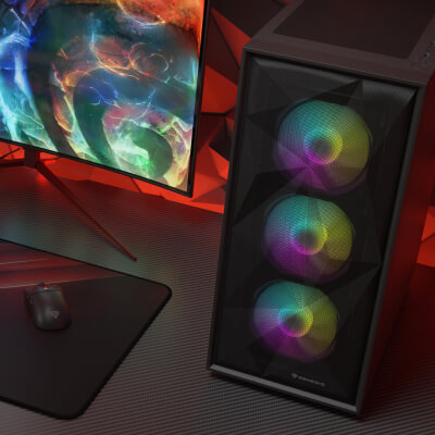 Komputer stacjonarny w obudowie z trzema wentylatorami RGB obok monitora gamingowego