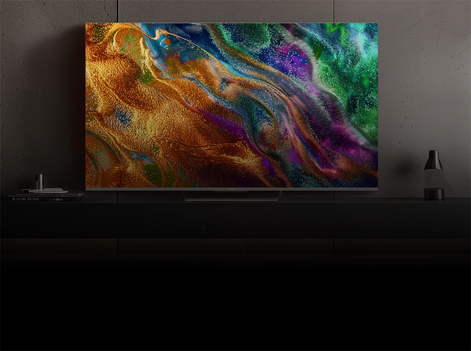 Telewizor Haier z abstrakcyjną, kolorową grafiką na ekranie