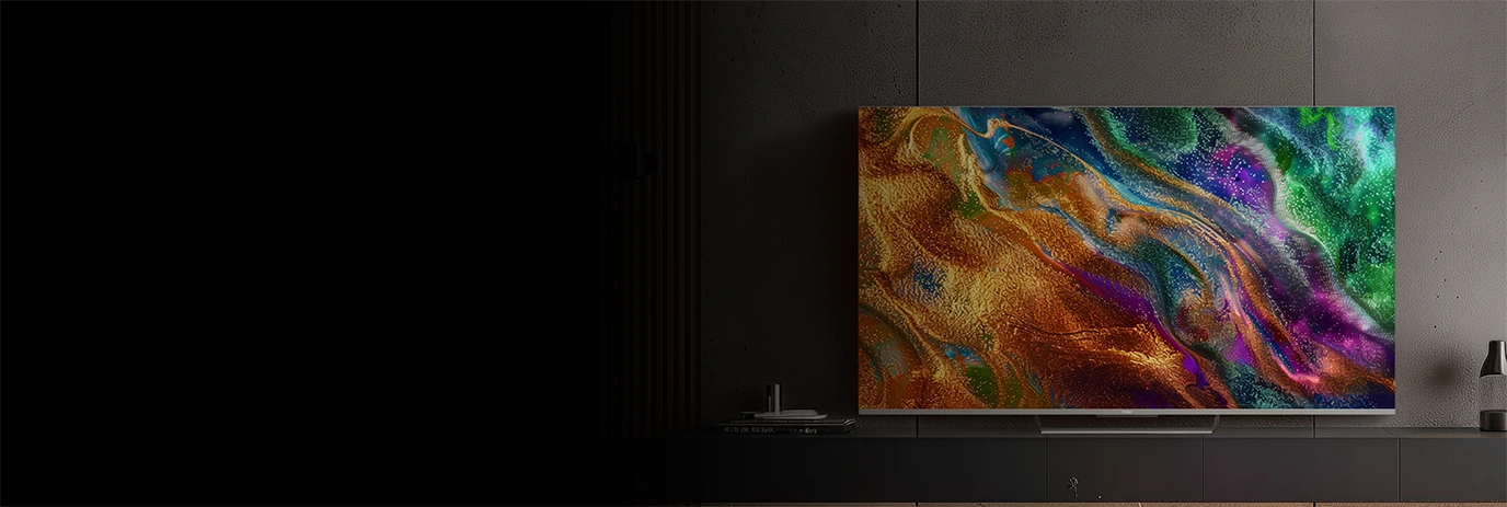 Telewizor Haier z abstrakcyjną, kolorową grafiką na ekranie