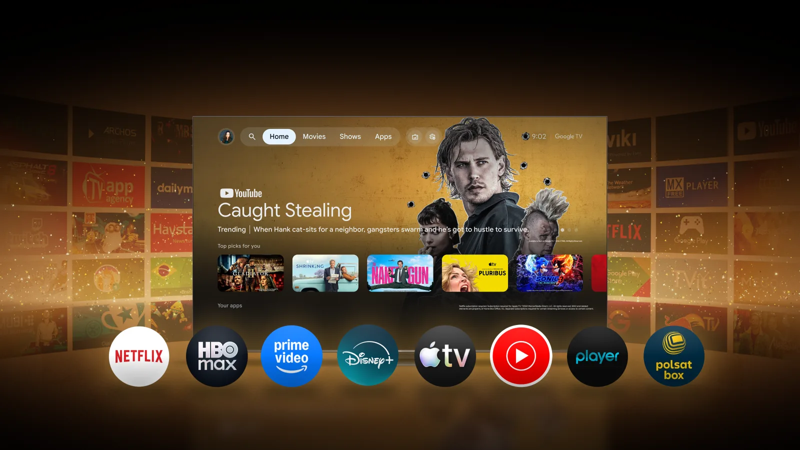 Interfejs Google TV z kafelkami filmów i ikonami serwisów streamingowych na ekranie telewizora.