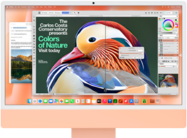 iMac, przód obudowy, kolor pomarańczowy, na ekranie apka do edycji zdjęć z narzędziami AI i apka Poczta w tle